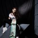短版條紋白上衣、字母圖樣黑色緊身褲、運動感條紋高筒鞋,all by Adidas Originals;短版黑色皮外套,Saint Laurent。