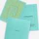 #Tiffany Blue Book1837年,品牌創辦人 Charles Lewis Tiffany 在紐約市開了一間文具飾品店,這可以說是 Tiffany 的前身,店裡銷售的產品多元,有文具、古玩與陶器,後來才陸續增加手錶、時鐘、銀器、黃金及鑽石珠寶等等。Tiffany 因應當時的市場銷售,出版了全美第一本郵購商品型錄,演變至今日,Tiffany Blue Book 則是刊載頂級珠寶的創意書。