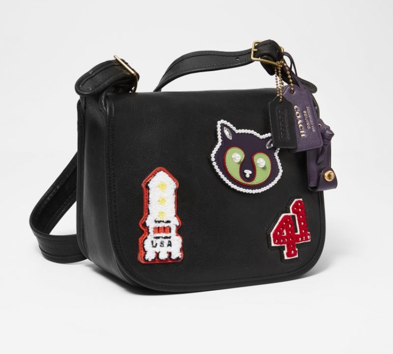 57034 Coach Saddle 黑色復古手袋 TWD 43,000