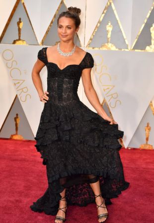 Alicia VikanderIn Louis Vuitton