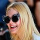 Elle Fanning.華麗的大墨鏡是點亮簡約造型的關鍵