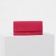 Céline,Drummed桃紅色小牛皮長夾 $23,000。