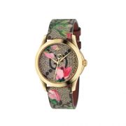 2018 G-Timeless 腕錶 中碼38mm,金色PVD錶殼,GG花卉面板與錶帶,NT31,000。